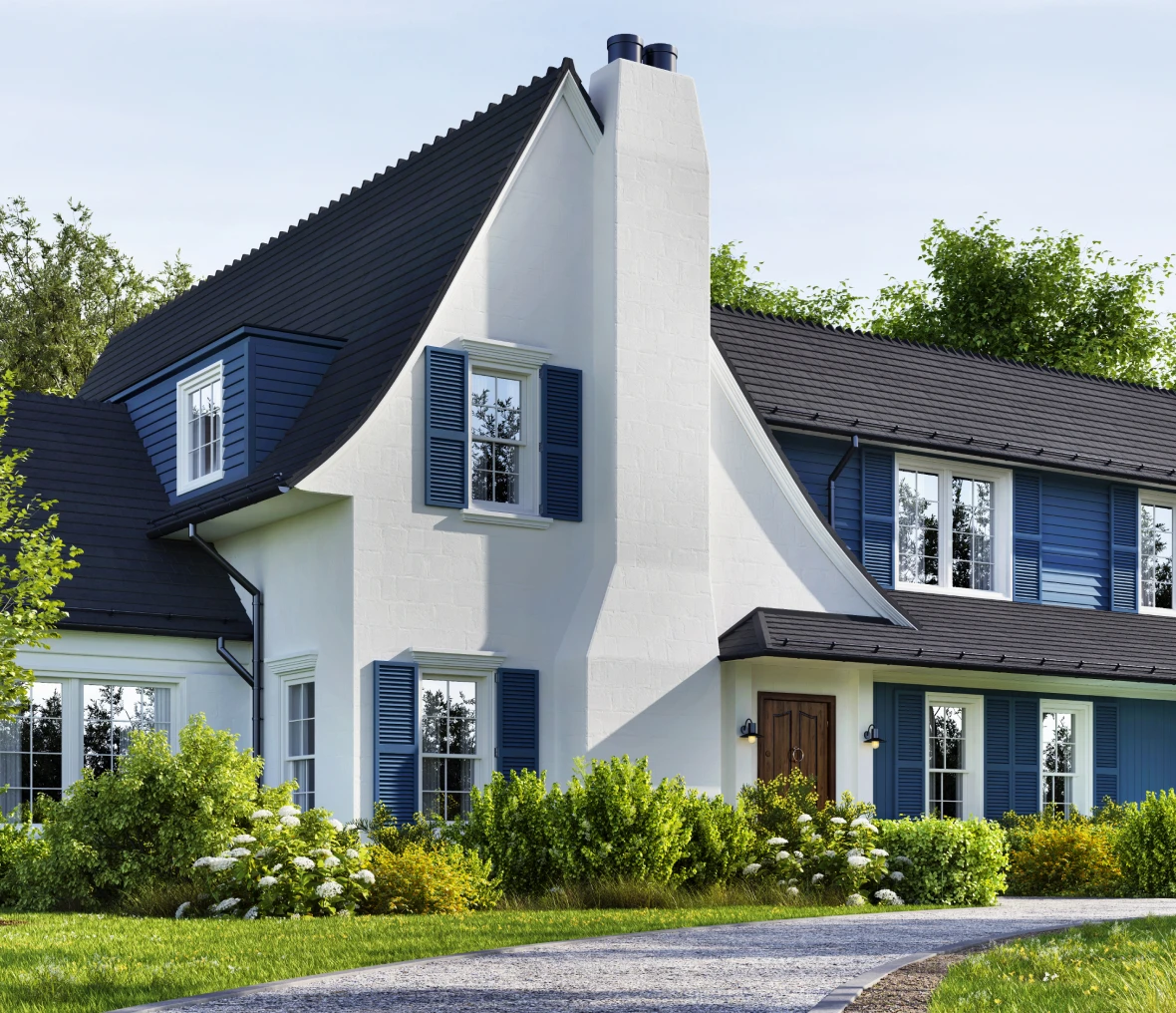 White house with blue shutters and garden