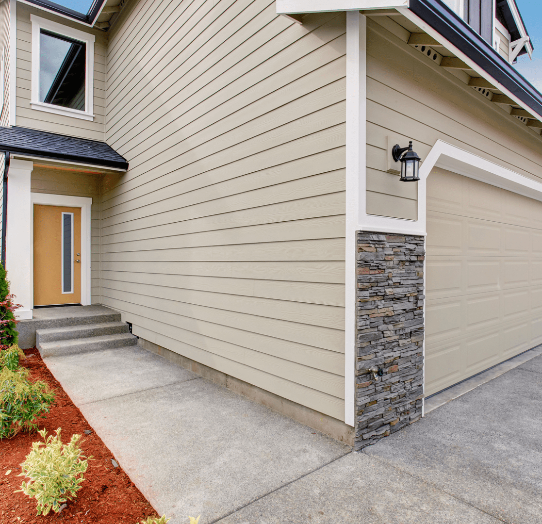 Modern house exterior with beige siding